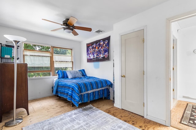 42 E Webster St, Merrick, NY 11566 - bedroom featuring wood finished floors and a ceiling fan