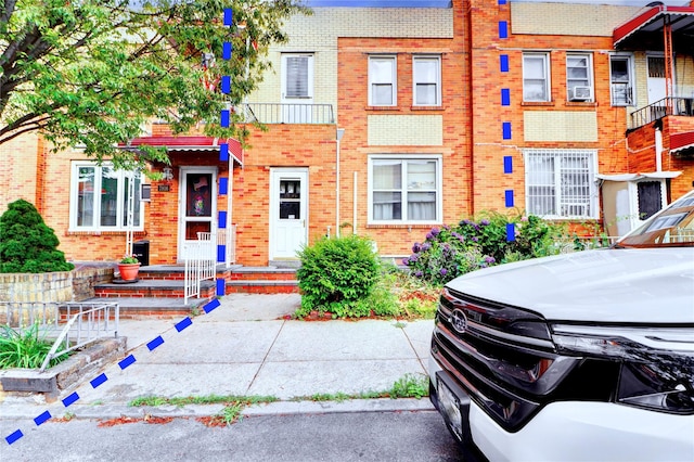 7914 Elks Rd, Elmhurst, NY 11373 - townhome / multi-family property featuring brick siding