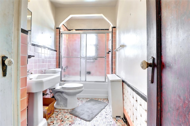 7914 Elks Rd, Elmhurst, NY 11373 - full bath featuring toilet and bath / shower combo with glass door