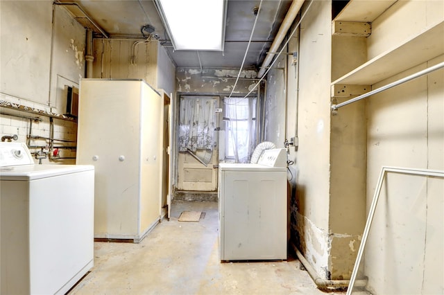 7914 Elks Rd, Elmhurst, NY 11373 - below grade area featuring washing machine and clothes dryer