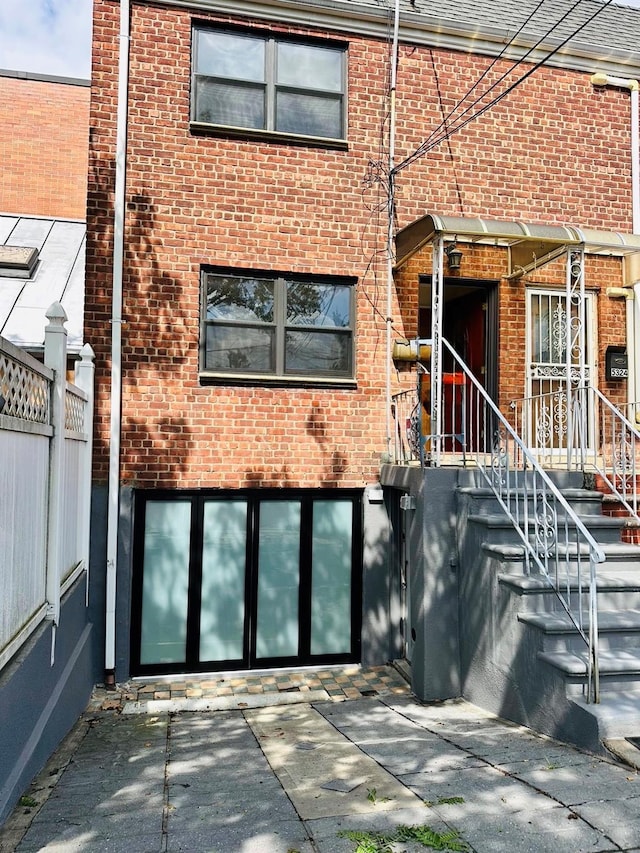53-26 61st St, Maspeth, NY 11378 - doorway to property with brick siding