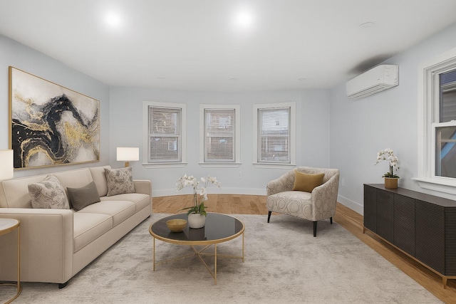 3919 Murdock Ave, Bronx, NY 10466 - living room featuring a wall mounted AC and wood finished floors