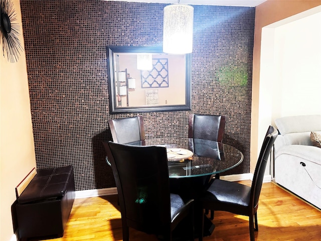 530 Dubois Ave Unit B3, Valley Stream, NY 11581 - dining space featuring wood finished floors and baseboards