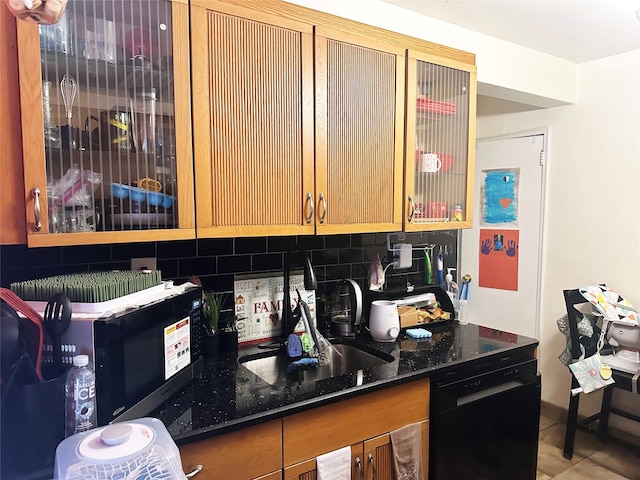 530 Dubois Ave Unit B3, Valley Stream, NY 11581 - kitchen featuring black appliances, decorative backsplash, dark stone counters, and glass insert cabinets