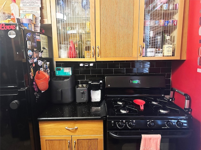 530 Dubois Ave Unit B3, Valley Stream, NY 11581 - kitchen featuring black appliances and decorative backsplash