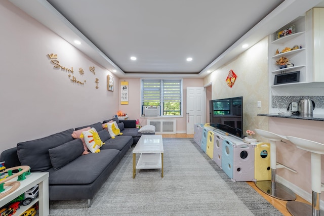 140-10 84th Dr Unit 2B, Briarwood, NY 11435 - living area featuring wood finished floors and recessed lighting