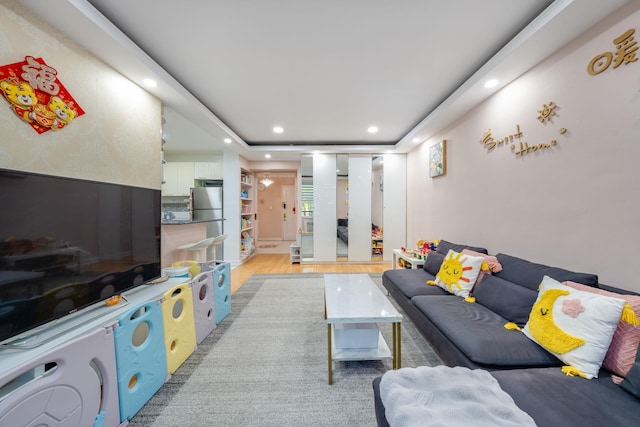 140-10 84th Dr Unit 2B, Briarwood, NY 11435 - living room with recessed lighting and light wood finished floors
