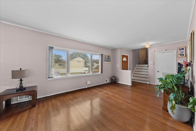 159 Branch Ave, Freeport, NY 11520 - unfurnished living room featuring wood finished floors, crown molding, and stairway