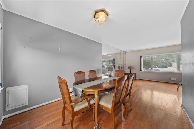 159 Branch Ave, Freeport, NY 11520 - dining area featuring wood finished floors and baseboards