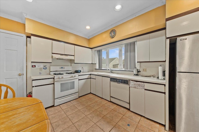 159 Branch Ave, Freeport, NY 11520 - kitchen featuring white appliances, crown molding, under cabinet range hood, light countertops, and white cabinetry