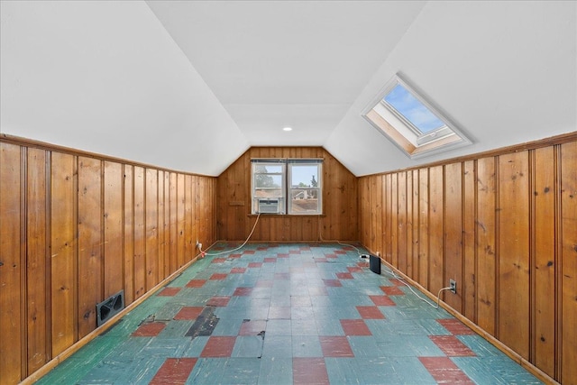 159 Branch Ave, Freeport, NY 11520 - additional living space with tile patterned floors, a skylight, lofted ceiling, wood walls, and cooling unit