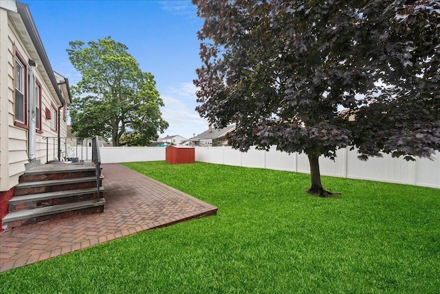 159 Branch Ave, Freeport, NY 11520 - fenced backyard featuring a patio area