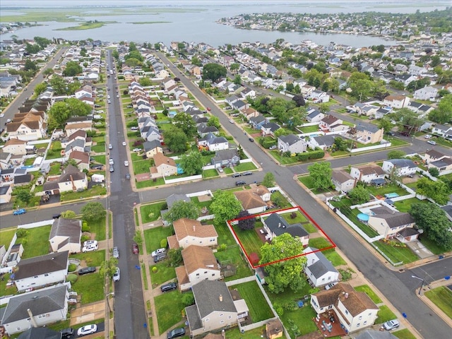 159 Branch Ave, Freeport, NY 11520 - aerial view of residential area featuring a nearby body of water and property parcel outlined