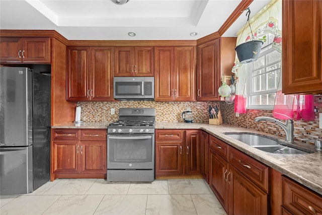 966 E 42nd St, Brooklyn, NY 11210 - kitchen with appliances with stainless steel finishes, a raised ceiling, light marble finish flooring, and light stone countertops