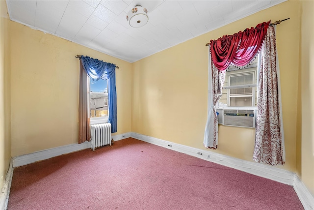 966 E 42nd St, Brooklyn, NY 11210 - carpeted spare room featuring radiator heating unit and cooling unit
