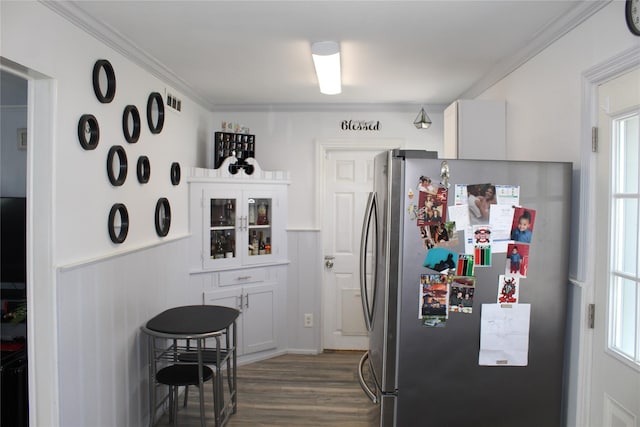 45 Tamarack St, Central Islip, NY 11722 - kitchen with freestanding refrigerator, dark wood-style floors, crown molding, healthy amount of natural light, and white cabinetry