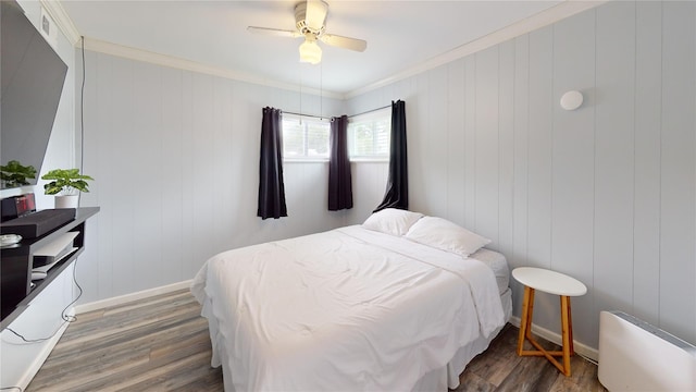 45 Tamarack St, Central Islip, NY 11722 - bedroom with crown molding, wood finished floors, and ceiling fan