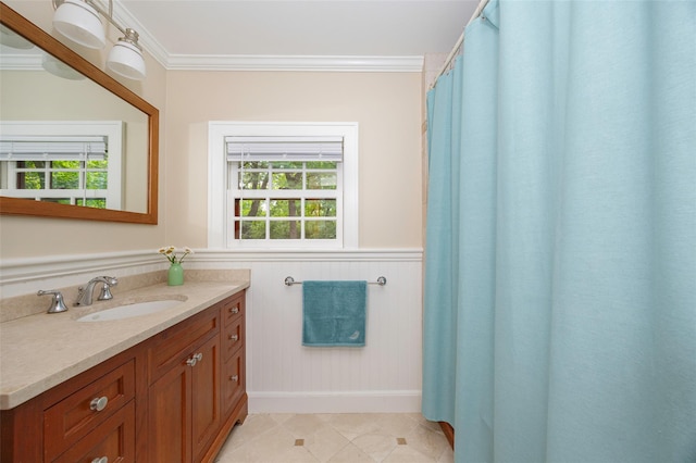 844 Salt Point Tpke, Pleasant Valley, NY 12601 - bathroom with ornamental molding, vanity, plenty of natural light, a wainscoted wall, and tile patterned flooring