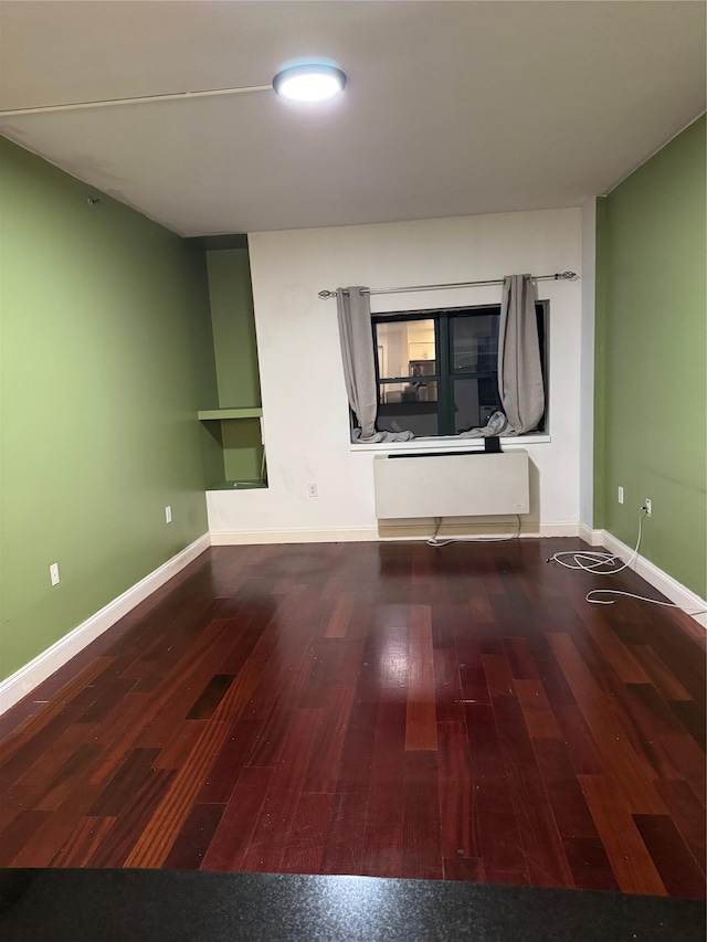 143-41 84th Dr Unit 1A, Briarwood, NY 11435 - unfurnished living room with wood finished floors
