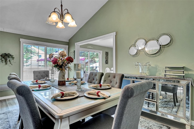 33 Breston Dr W, Shirley, NY 11967 - dining area featuring a chandelier, wood finished floors, and high vaulted ceiling