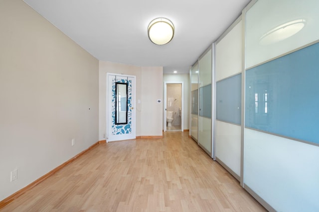 71-24 164th St Unit 2, Fresh Meadows, NY 11365 - unfurnished room featuring light wood-style floors and baseboards