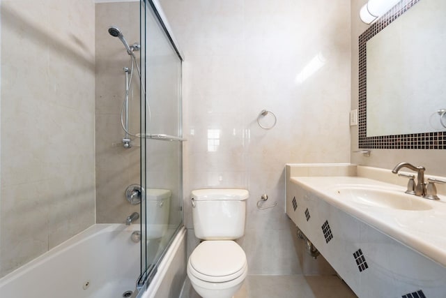 71-24 164th St Unit 2, Fresh Meadows, NY 11365 - full bath with tile walls, a combined bath / shower with jetted tub, and vanity