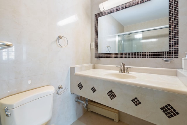 71-24 164th St Unit 2, Fresh Meadows, NY 11365 - bathroom featuring tile walls, vanity, and a shower with door