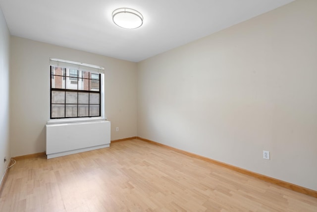 71-24 164th St Unit 2, Fresh Meadows, NY 11365 - empty room featuring light wood-style flooring and baseboards