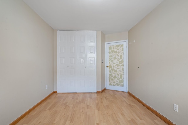 71-24 164th St Unit 2, Fresh Meadows, NY 11365 - unfurnished bedroom featuring light wood-style floors and a closet