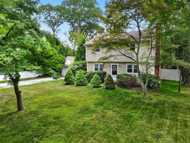 12 Greentree Ct, Northport, NY 11768 - colonial inspired home featuring a garage and a chimney
