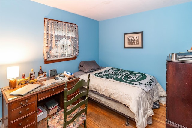 12 Greentree Ct, Northport, NY 11768 - bedroom featuring wood finished floors
