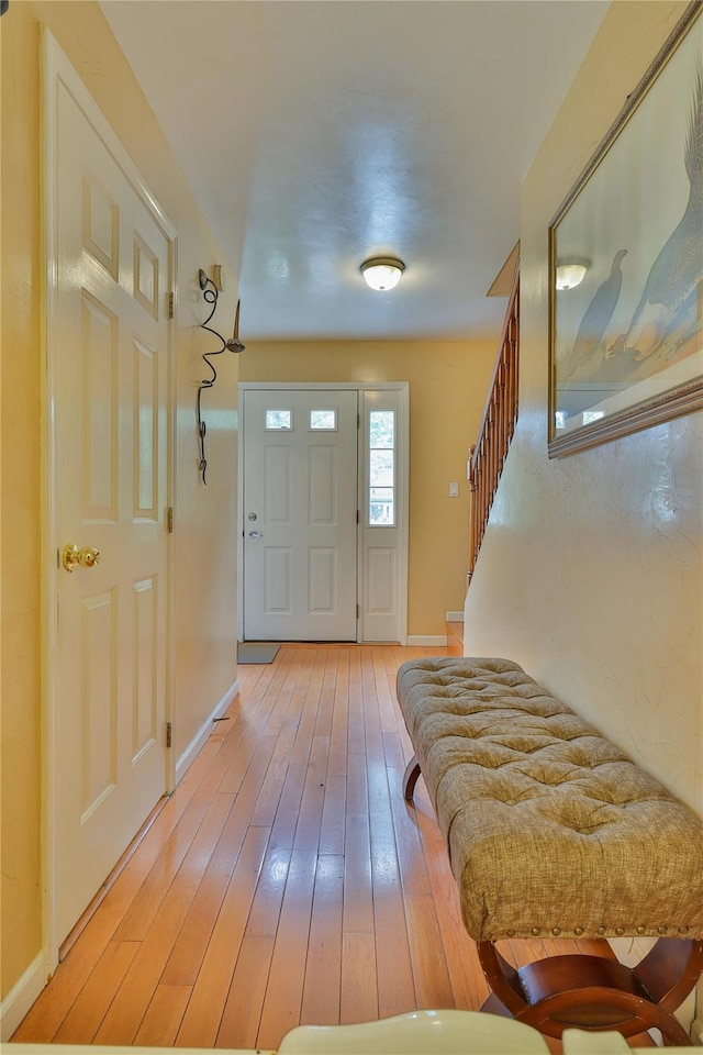 22 Indian Ave, Flanders, NY 11901 - entrance foyer featuring stairs and light wood-type flooring