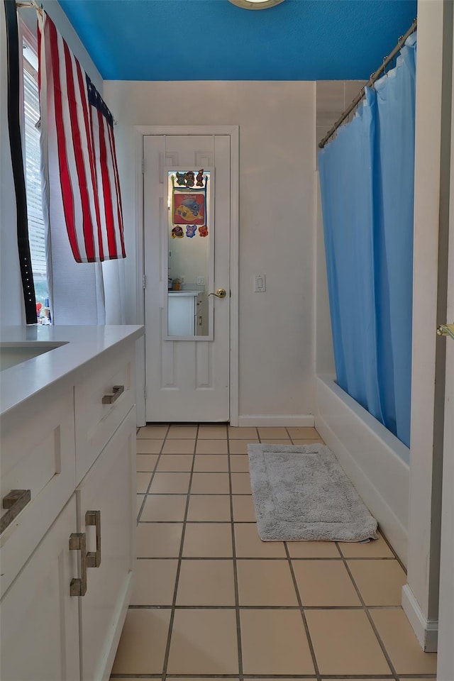 22 Indian Ave, Flanders, NY 11901 - doorway to outside with light tile patterned floors and baseboards
