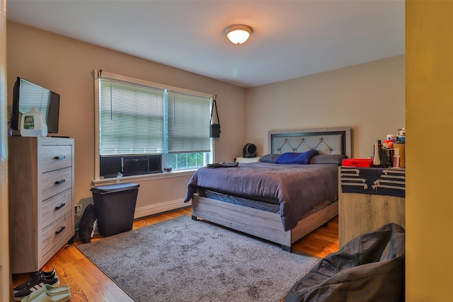 22 Indian Ave, Flanders, NY 11901 - bedroom featuring light wood-style flooring and baseboard heating