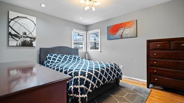 95 Foster Ave, Valley Stream, NY 11580 - bedroom featuring wood finished floors and recessed lighting