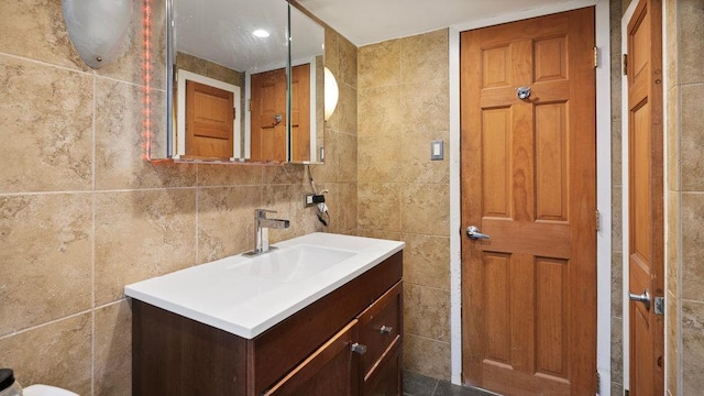 95 Foster Ave, Valley Stream, NY 11580 - bathroom featuring tile walls and vanity