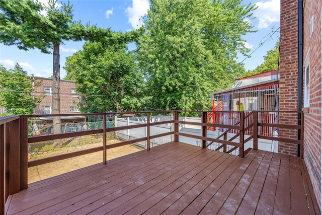 24-08 97th St, East Elmhurst, NY 11369 - deck featuring a fenced backyard