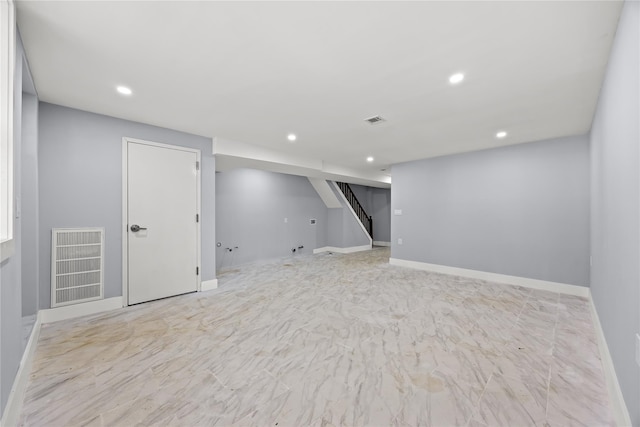 24-08 97th St, East Elmhurst, NY 11369 - unfurnished room with stairway, recessed lighting, and marble finish flooring