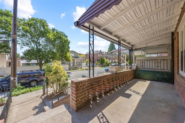 24-08 97th St, East Elmhurst, NY 11369 - view of patio featuring a residential view