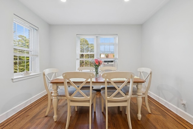 102 S Village Ave Unit 3A, Rockville Centre, NY 11570 - dining space featuring wood finished floors, recessed lighting, and cooling unit