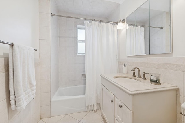 102 S Village Ave Unit 3A, Rockville Centre, NY 11570 - bathroom with vanity, tile walls, shower / bath combo, and tile patterned flooring