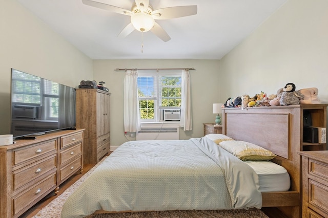 102 S Village Ave Unit 3A, Rockville Centre, NY 11570 - bedroom featuring radiator heating unit, cooling unit, and a ceiling fan