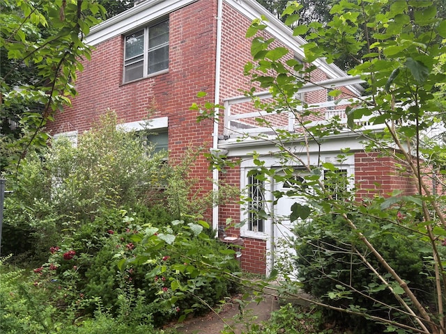 425 W 256th St, Bronx, NY 10471 - view of side of property featuring brick siding
