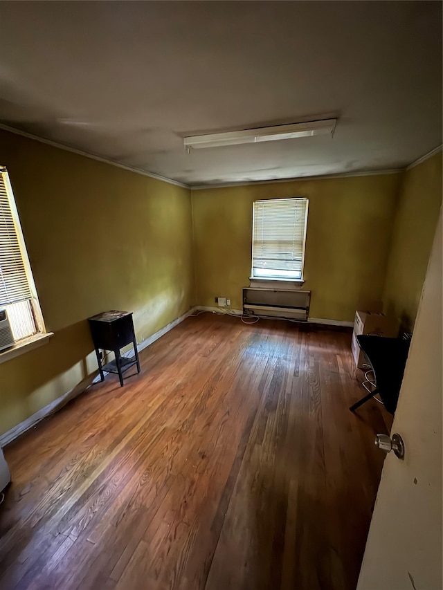 425 W 256th St, Bronx, NY 10471 - spare room featuring wood finished floors and crown molding