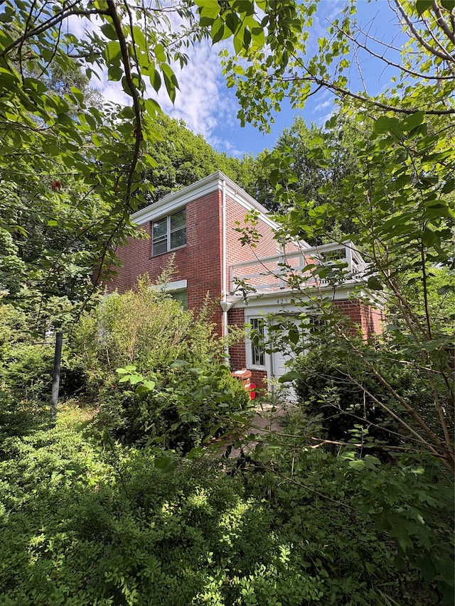 425 W 256th St, Bronx, NY 10471 - view of side of home with brick siding