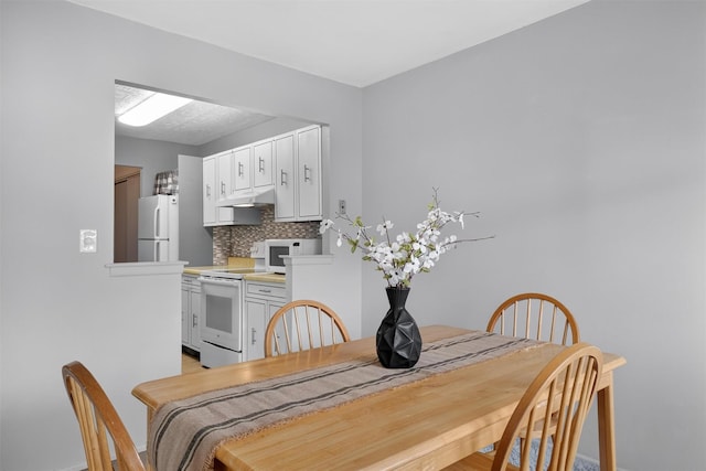 17 Village Park Dr Unit 3A, Fishkill, NY 12524 - dining room with baseboards