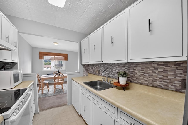 17 Village Park Dr Unit 3A, Fishkill, NY 12524 - kitchen featuring white appliances, white cabinetry, tasteful backsplash, and light countertops