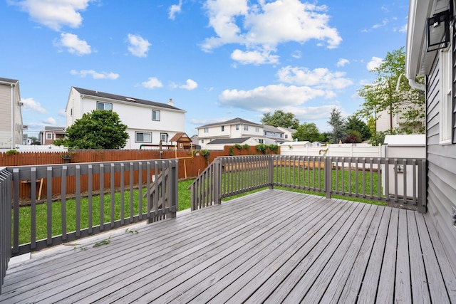 2572 Riverside Ave, Seaford, NY 11783 - wooden terrace featuring a fenced backyard and a residential view