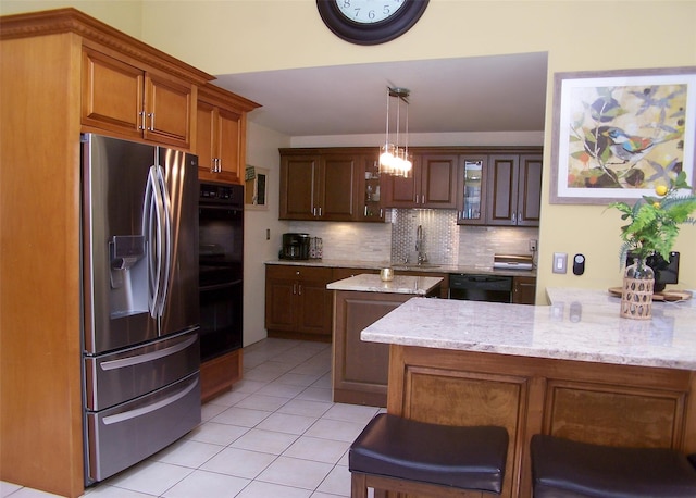 2189 Cedar Ave, Ronkonkoma, NY 11779 - kitchen featuring black appliances, decorative backsplash, light tile patterned floors, hanging light fixtures, and glass insert cabinets