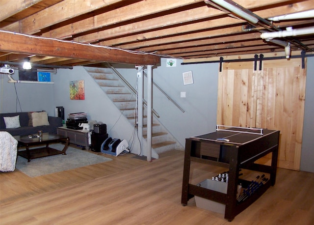2189 Cedar Ave, Ronkonkoma, NY 11779 - below grade area featuring stairs and wood finished floors